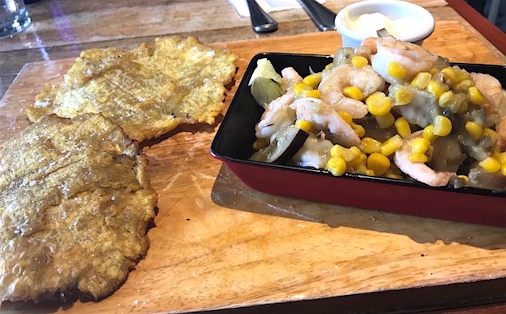 In Cartagena, Colombian patacones are served with fresh ceviche