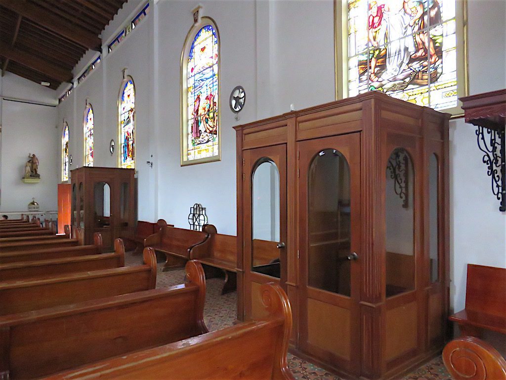 Confessionals on the right side of the church