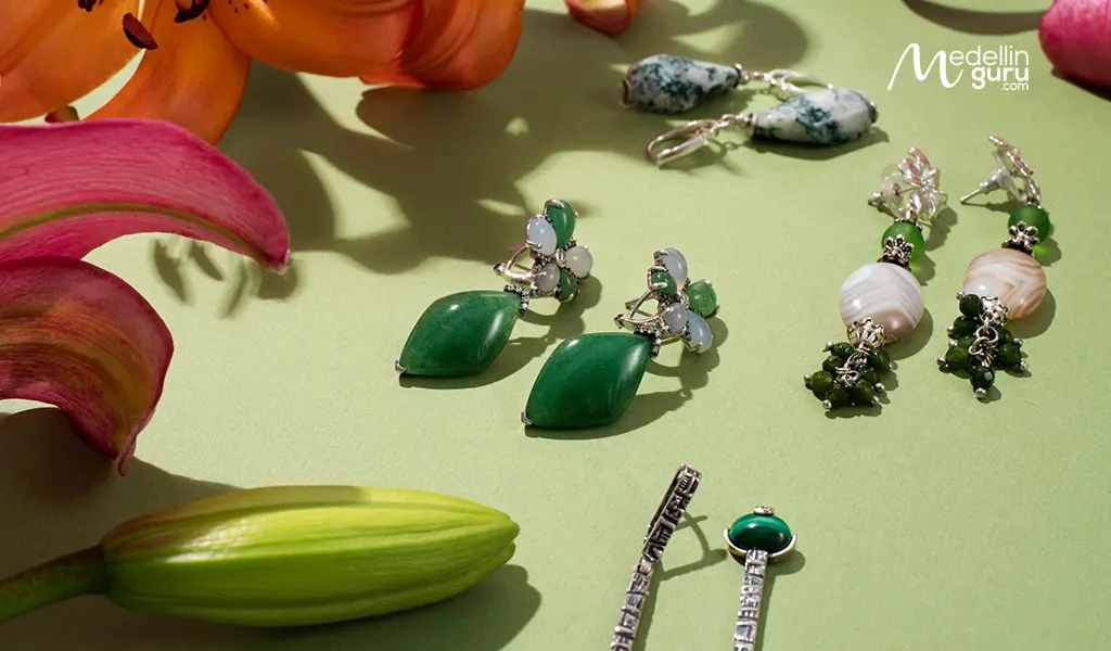 Colombian emerald jewelry with silver earrings and pendants with vivid green stones