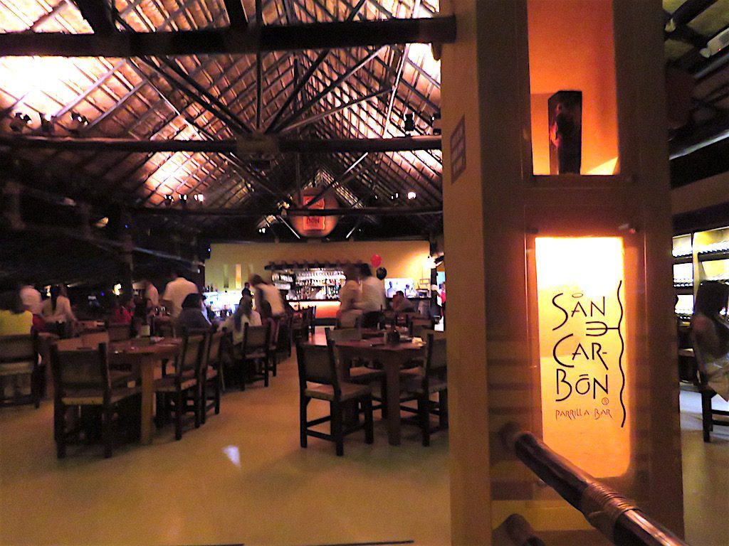 Entrance to San Carbon, which is a popular steakhouse in Medellín reopening on July 6