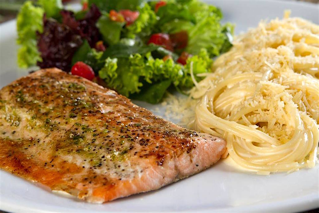 Il Forno Salmon with Alfredo pasta and salad, photo courtesy of Il Forno - Medellin Guru