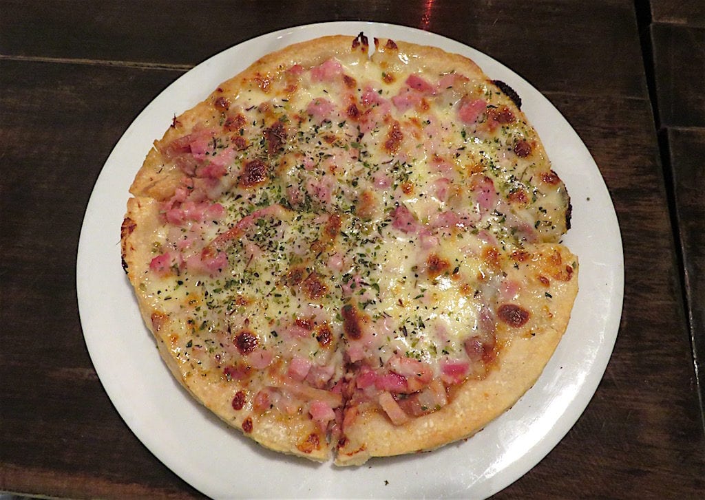 Bigotes small German pizza with German salami and German bacon