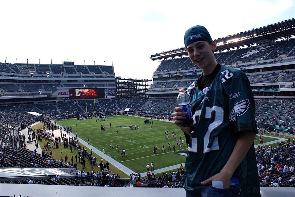Sam at age 15 in Philadelphia watching an Eagles game
