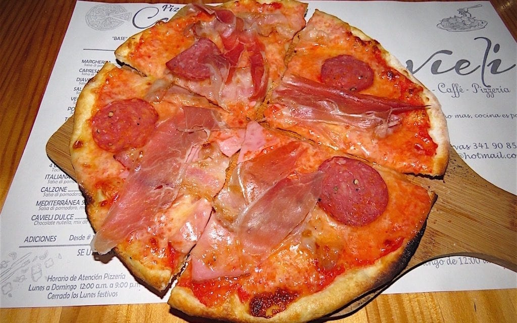 Four-meat pizza at Cavieli: A Popular Pizzeria in Medellín with Very Good Pizza - Medellin Guru