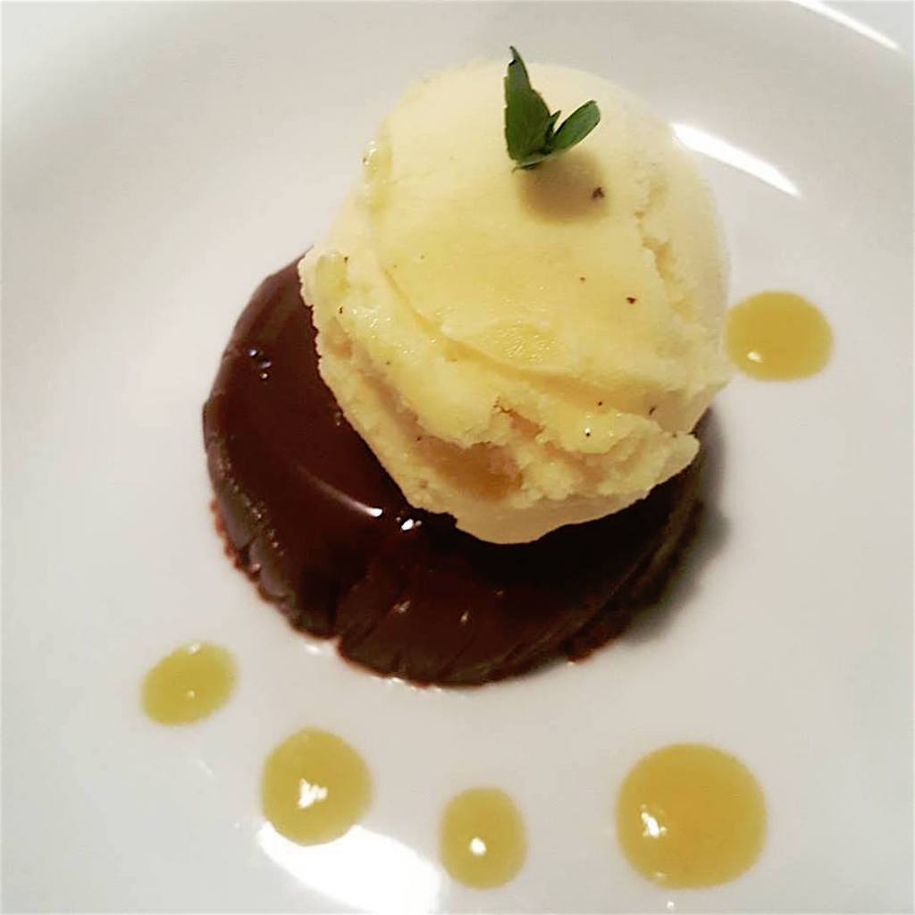 “Tentación de chocolate” dessert, which is a bittersweet chocolate with passionfruit sorbet, photo courtesy of Malevo