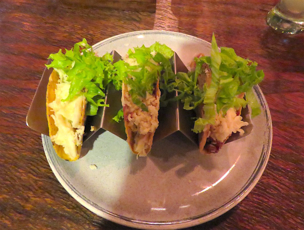Trio of pork tacos at Delirio Exquisito