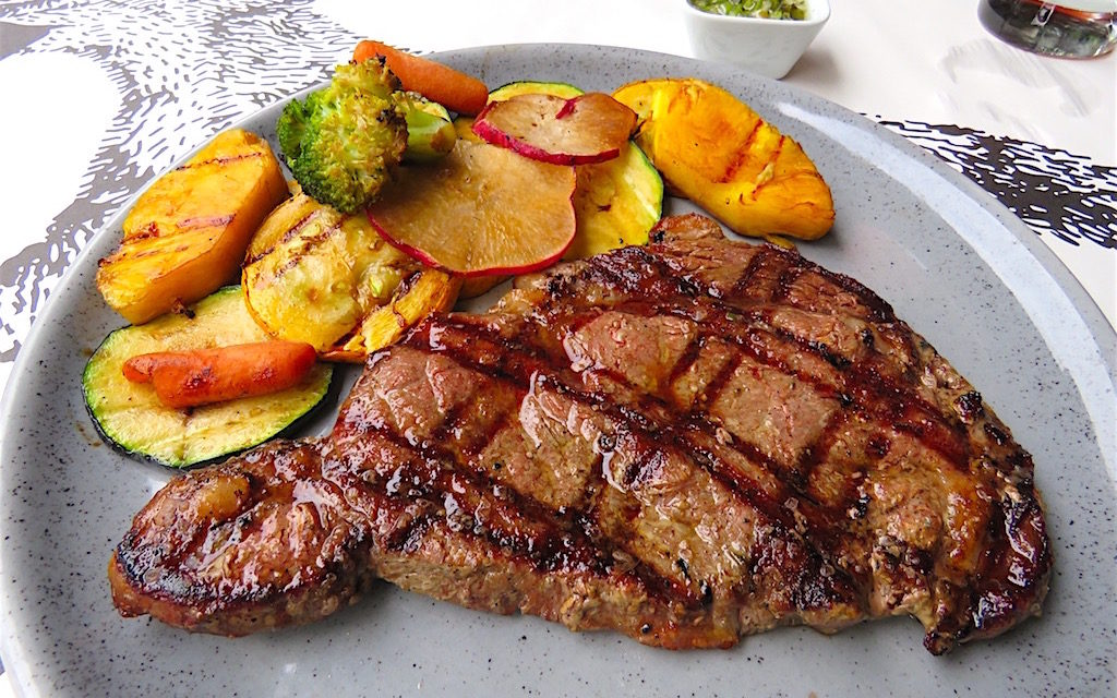 Imported ribeye steak with grilled vegetables at Voraz
