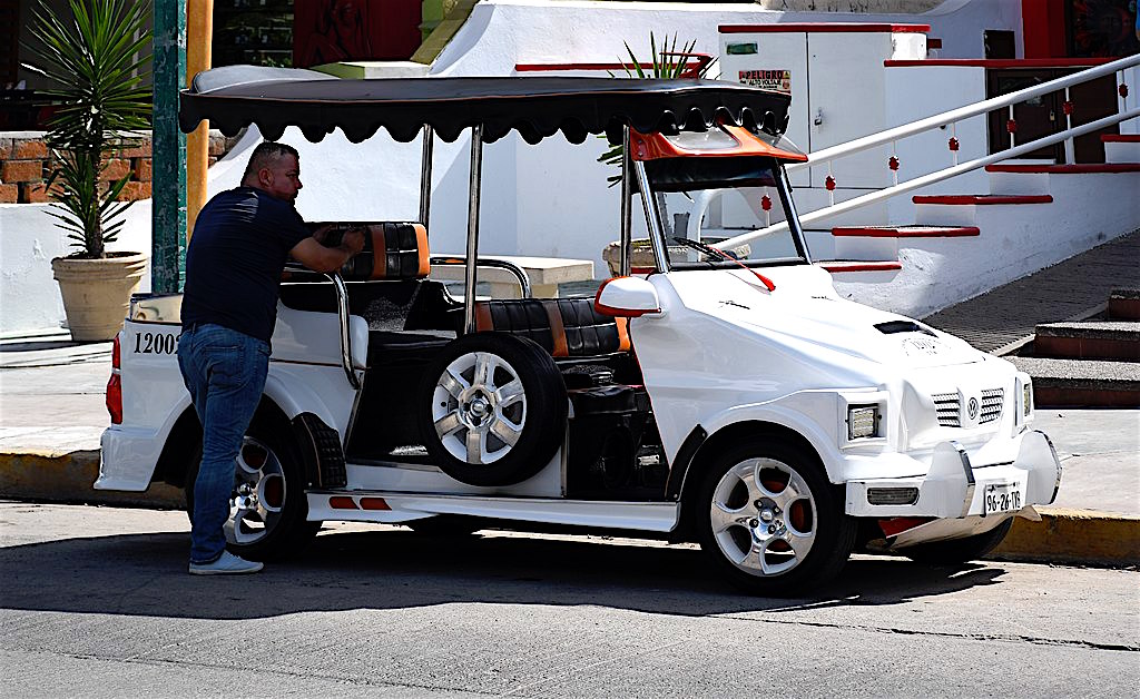 Mazatlán has golf-cart-like taxis known as Pulmonias, photo by Gzzz