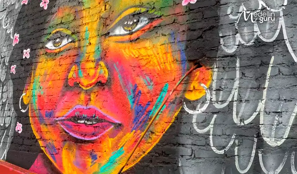 Colorful street art mural in Cali's Siloé neighborhood