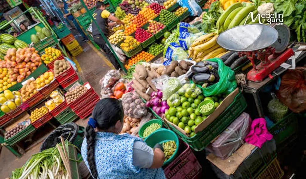 Colorful tropical fruits and vegetables at a Colombian Paloquemao market.