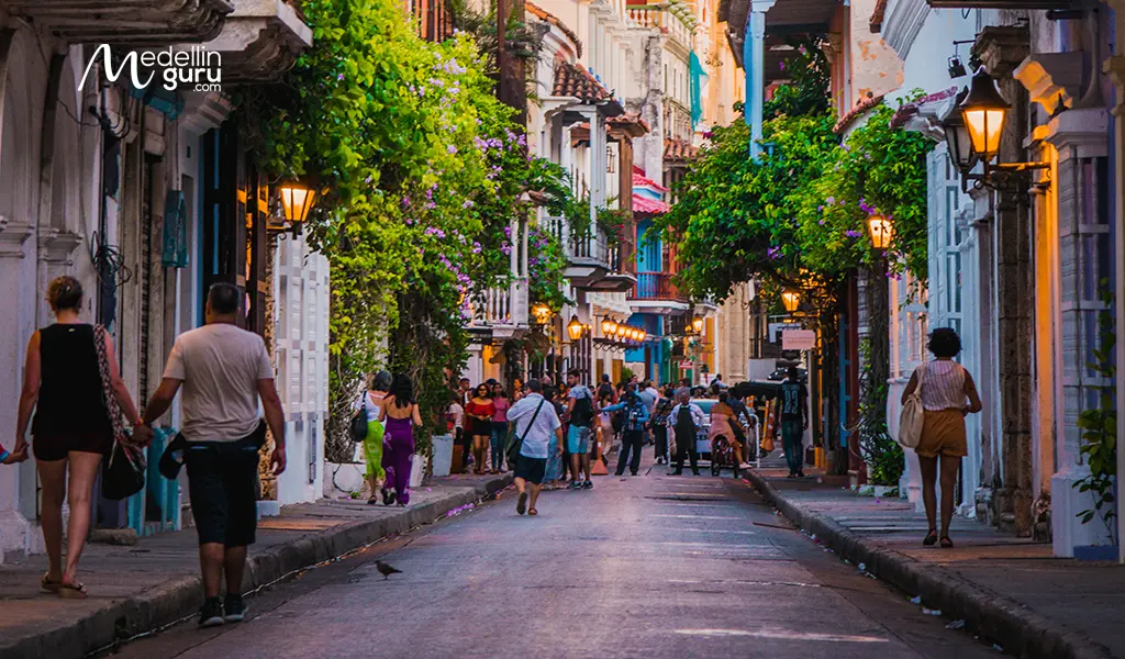 Foreigners exploring the iconic, colorful streets of Cartagena’s historic walled city