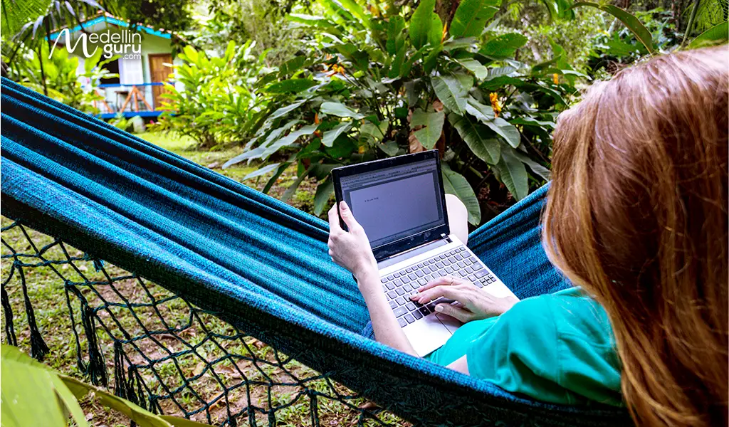 Digital nomad working remotely in Colombia, adapting to new visa challenges in 2025
