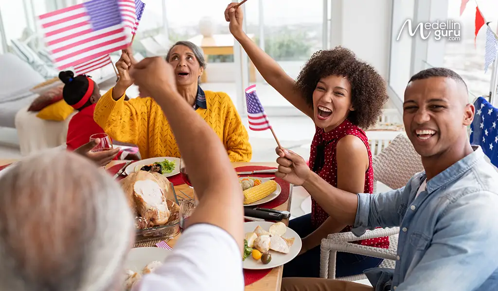 American flags displayed at an Independence Day celebration, connecting expats to their national identity in Colombia