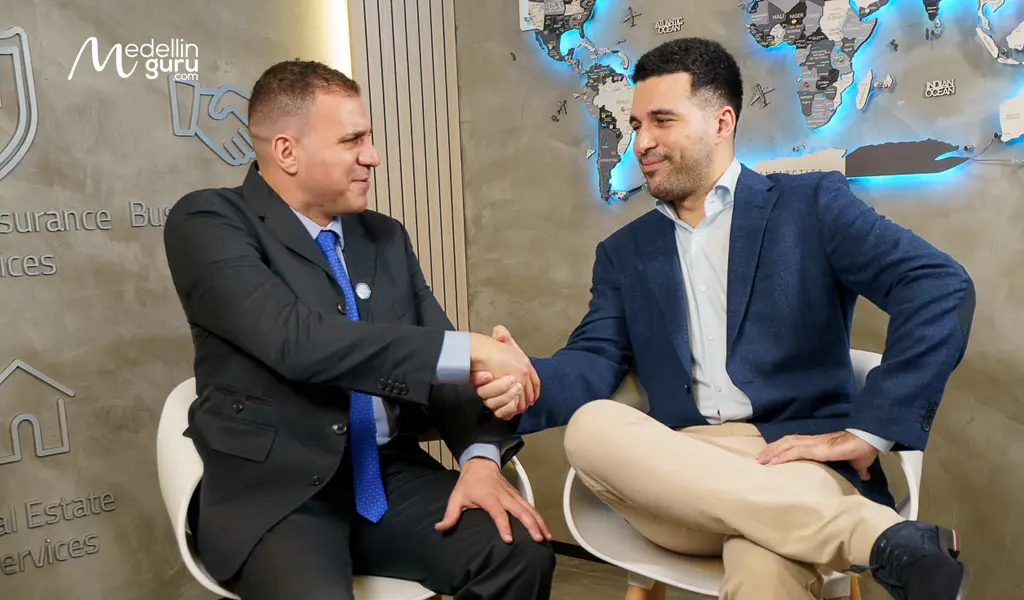 An expatgroup.co advisor shaking hands with a client, representing agreement for the various services offered by the team