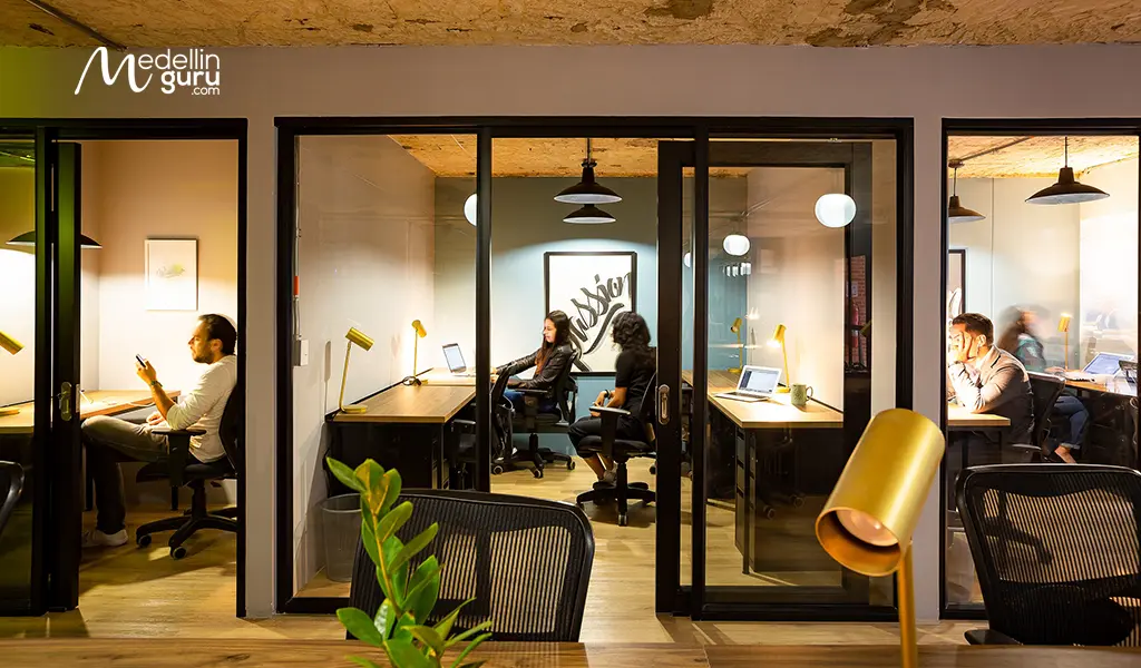 Private workspace booths at Selina Parque 93, Bogotá, ideal for digital nomads.
