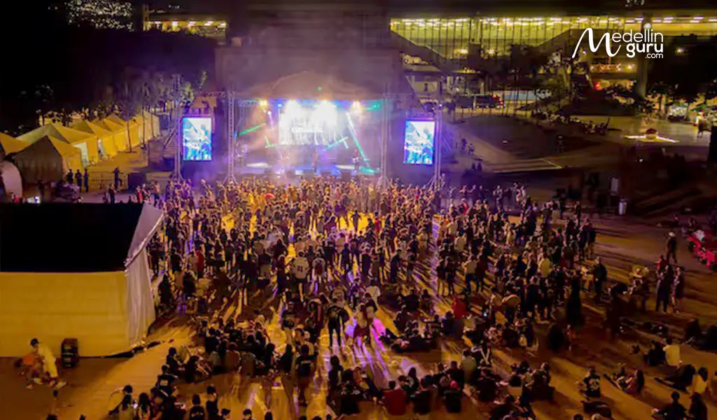 Energetic concert scene illustrating the phrase '¡Qué chimba de concierto!' capturing the essence of a great live show