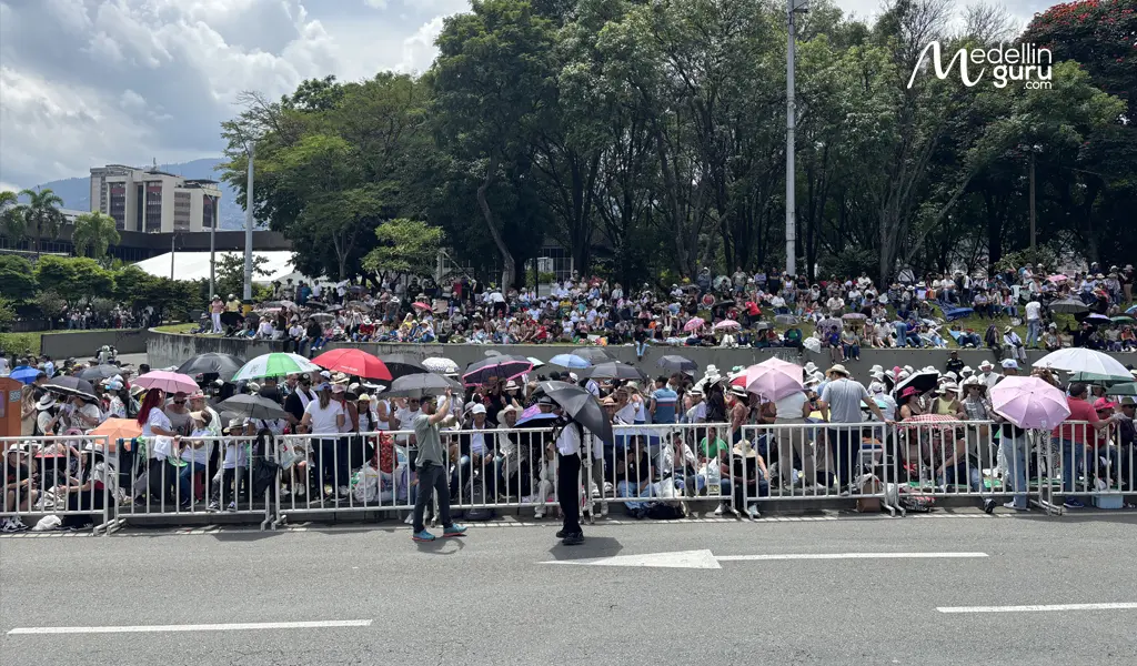 A photo of the vibrant Desfile de Silleteros 2025, showing the scale of the event and the crowds that are a key consideration for any Medellín flower festival guide.